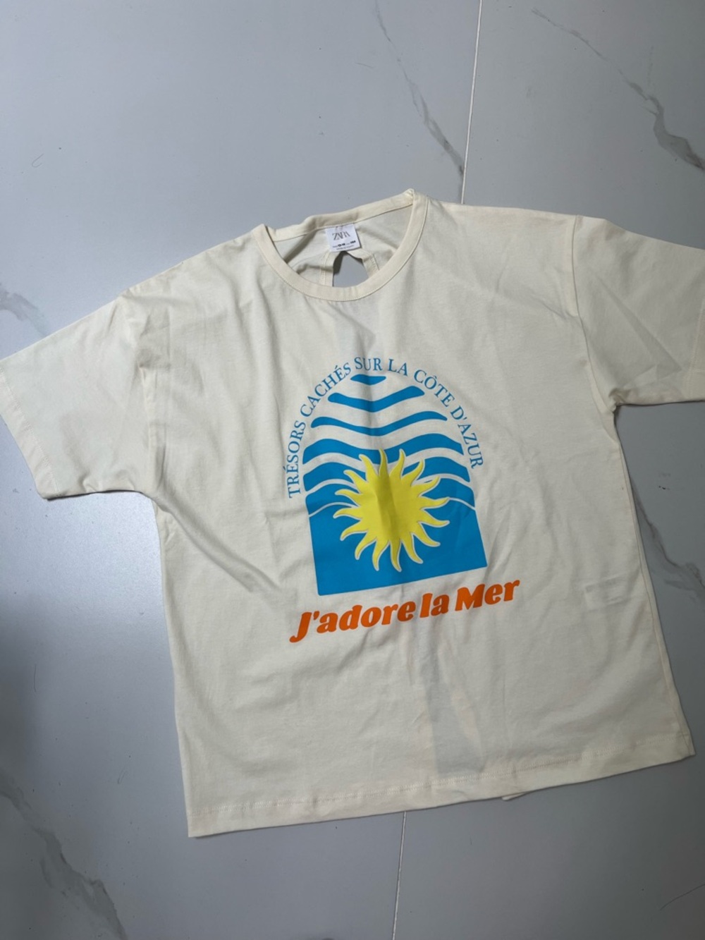 Zara Cream Graphic Tee with Blue, Yellow & Orange Print